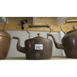 An old copper kettle.