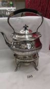 A superb quality silver plate spirit kettle on stand complete with burner, in good condition.