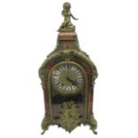 An excellent Beulle mantel clock in good working order, 60 cm tall.
