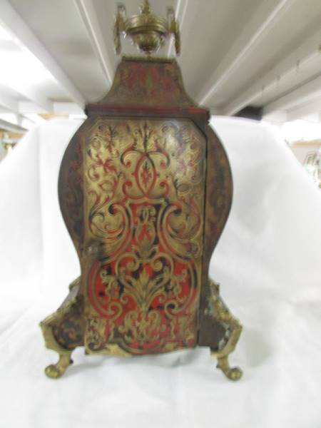 A superb quality buelle mantel clock. in good condition. - Image 8 of 21