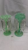 Two Victorian green glass lustres.