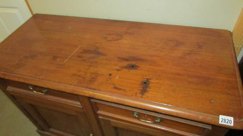 A mahogany 2 door, 2 drawer sideboard. - Image 2 of 2