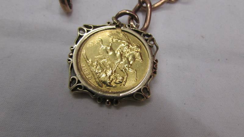 A Victorian 1889 sovereign on a 9ct gold watch chain (chain 43 grams) (Total weight 53. - Image 3 of 4