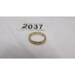 A 9ct gold wedding ring, size J, 2 grams.