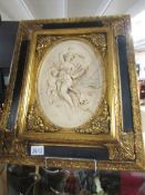 A gilt framed classical scene plaque,