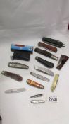 A mixed lot of old penknives.