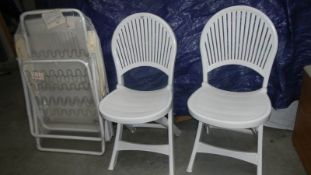 Three plastic folding chairs. (Collect only).
