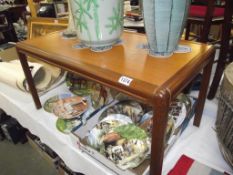 A teak coffee table,