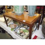 A teak coffee table,