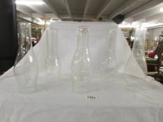 Six glass oil lamp chimneys, all in good condition.