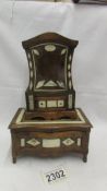 An antique wooden pocket watch stand with 2 drawers and inlaid with bone.