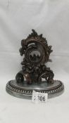 An ornate Victorian pocket watch stand.