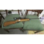 An air rifle with sight. ****Condition report**** Model SMK 15 Cal 4.5mm/.