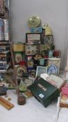 A large quantity of assorted advertising tins.