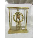 A good quality brass skeleton style clock in working order.