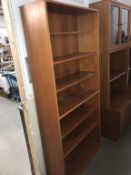 A vintage teak bookcase/shelves (81cm x 28cm x 184cm high)