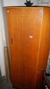 A good solid "Christniner" corner wardrobe with key and inner mirror. (Collect only).