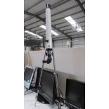 A 50 x 50 science telescope with tripod.