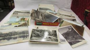 Approximately 200 vintage postcards.