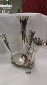 A silver plate four trumpet epergne.