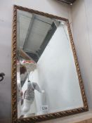 A vintage gil framed bevel edge mirror 45 x 70 cm