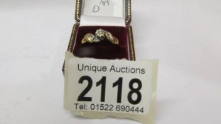 An 18ct gold and diamond ring, size L.