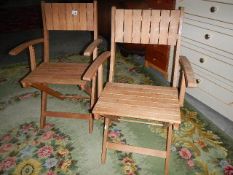 A pair of outdoor folding chairs. (Collect only).