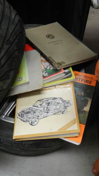 Three wheels with tyres, wheel rims, motoring books etc., (Collect only). - Image 2 of 5