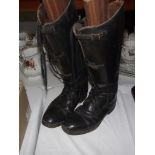 A pair of vintage riding boots