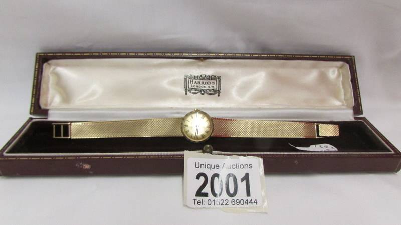 A Jaeger Le Coutre ladies all gold wrist watch, in working order.