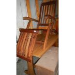 A folding wooden outdoor chair with brass fittings. (Collect only).