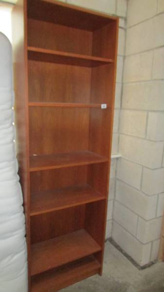 A tall five shelf book case. (Collect only).