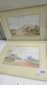 A pair of framed and glazed rural scene watercolours signed J Russell.