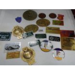 A collection of classic car rally plaques and badges including Lincoln, Newark, Derby etc.