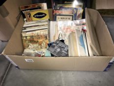 A box of mixed ephemera including cigarette card albums,