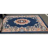 A large blue & cream/salmon living room carpet (approximately 190cm x 280cm)