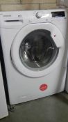 A Hoover 7kg 'Vision Dynamic' A+ digital washing machine, DYN 7164 DLX. (Collect only).