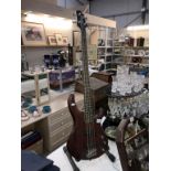 A Cort bass guitar serial no 15097456, stand not included,