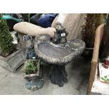 A garden bird bath and an a/f rabbit planter.