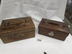 A travelling stationery box and a leather box.