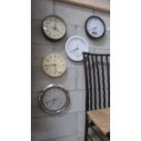 Five wall clocks including a radio controlled example.