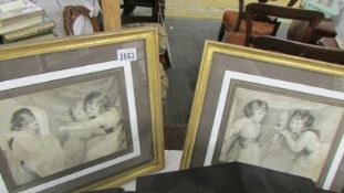 A pair of framed and glazed studies of children play acting.