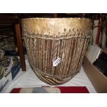 A good old African bongo drum with animal skin covering