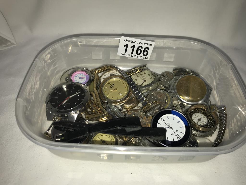 A mixed lot of watch heads & watch parts for spares