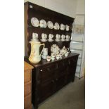 A three door oak dresser.