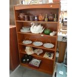 A teak book case.