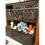 An oak lead glazed dresser.