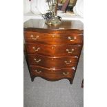 A mahogany four drawer chest.