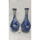 A pair of blue Chinese vases.