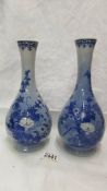 A pair of blue Chinese vases.